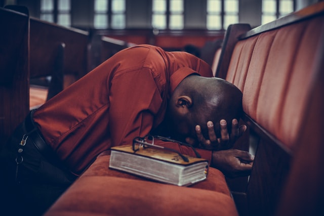 Image of Man praying- find the right brand name